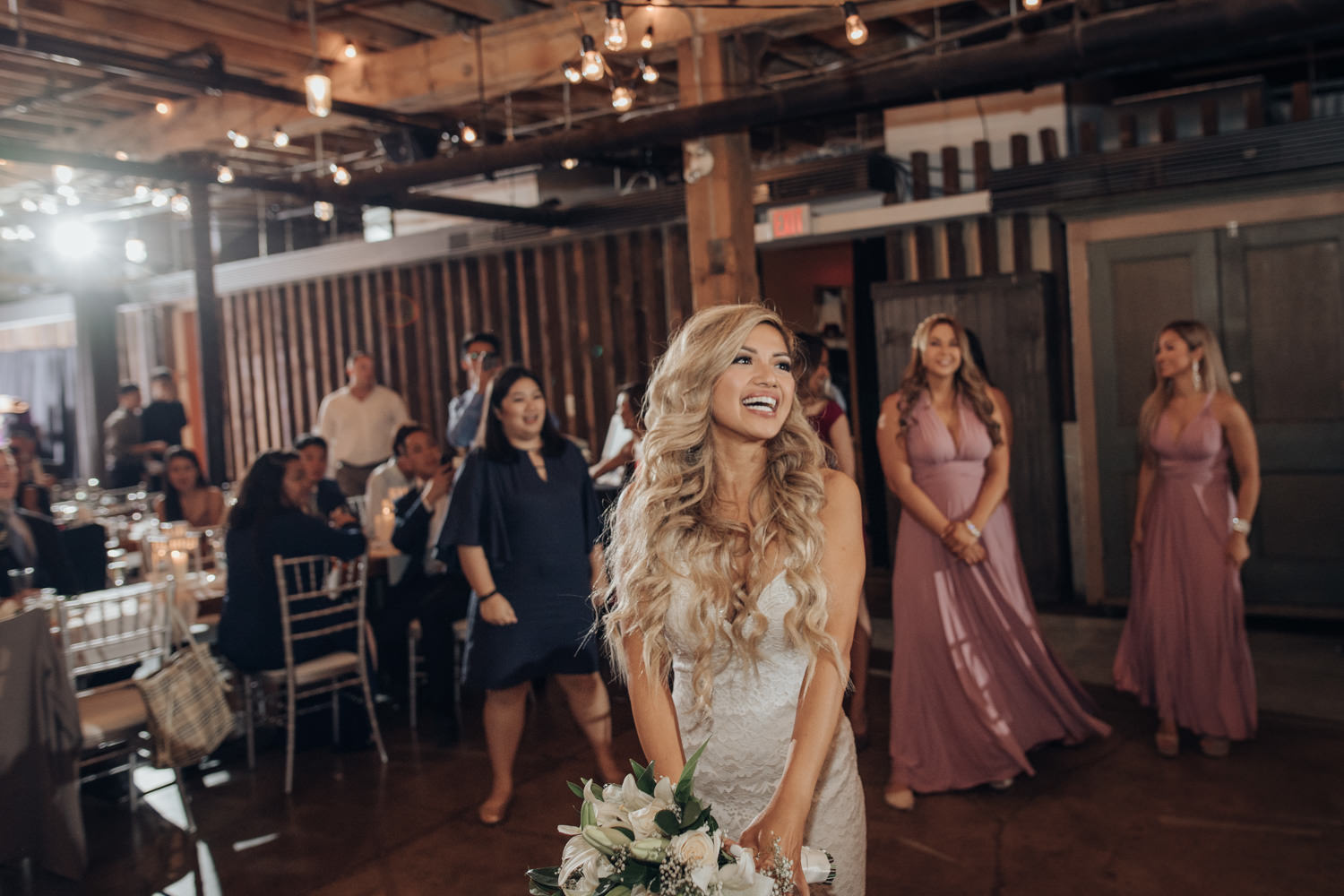 The Loft Indoor Wedding Reception Bouquet Toss