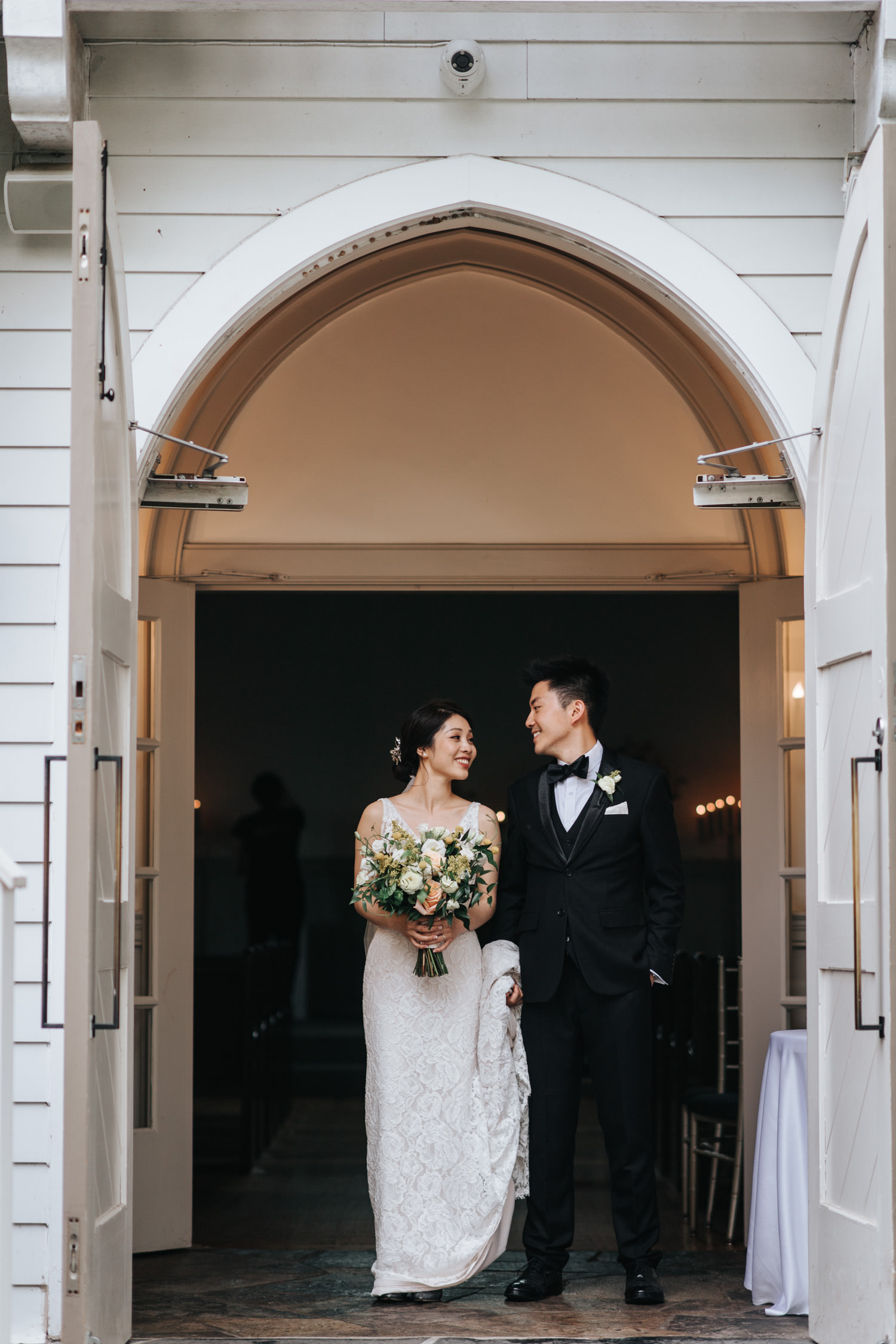Doctor's House wedding after ceremony at white wooden chapel