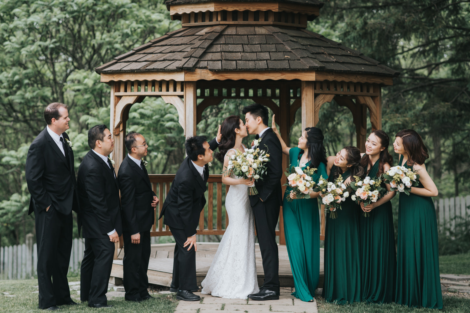 Doctor's House wedding bridal party at wooden gazebo fun