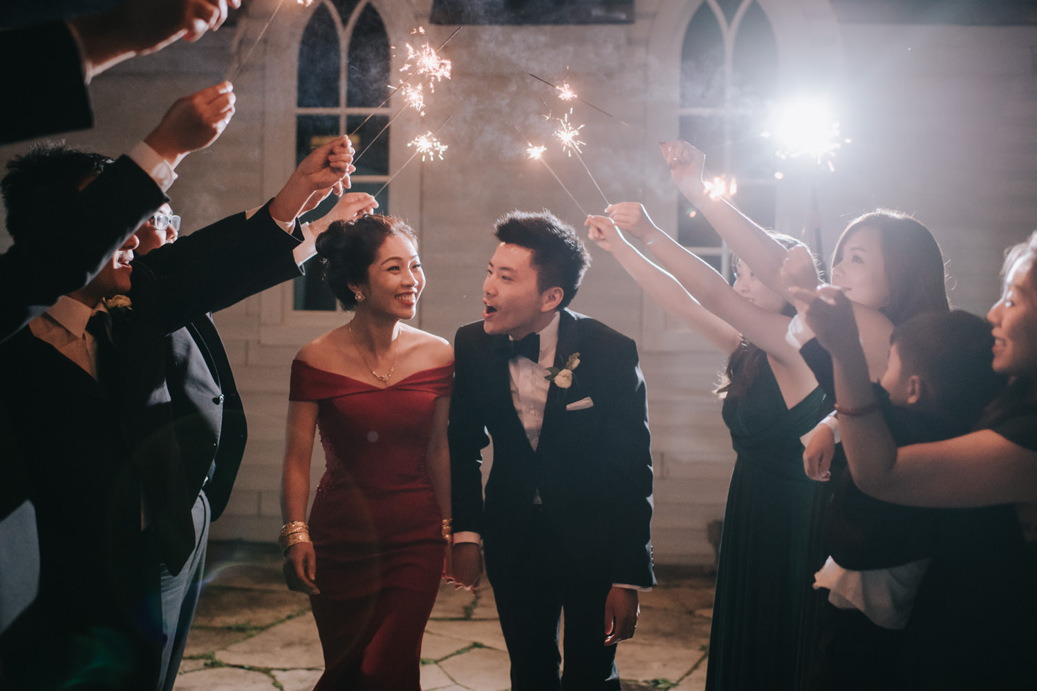 Doctor's House wedding reception evening portrait with sparklers romantic cheerful