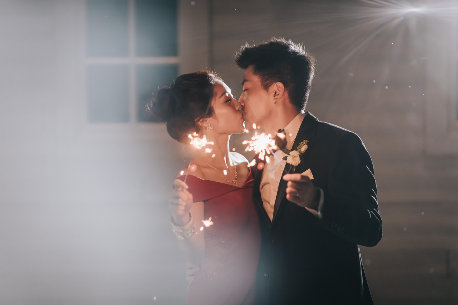 Doctor's House wedding reception evening portrait with sparklers romantic