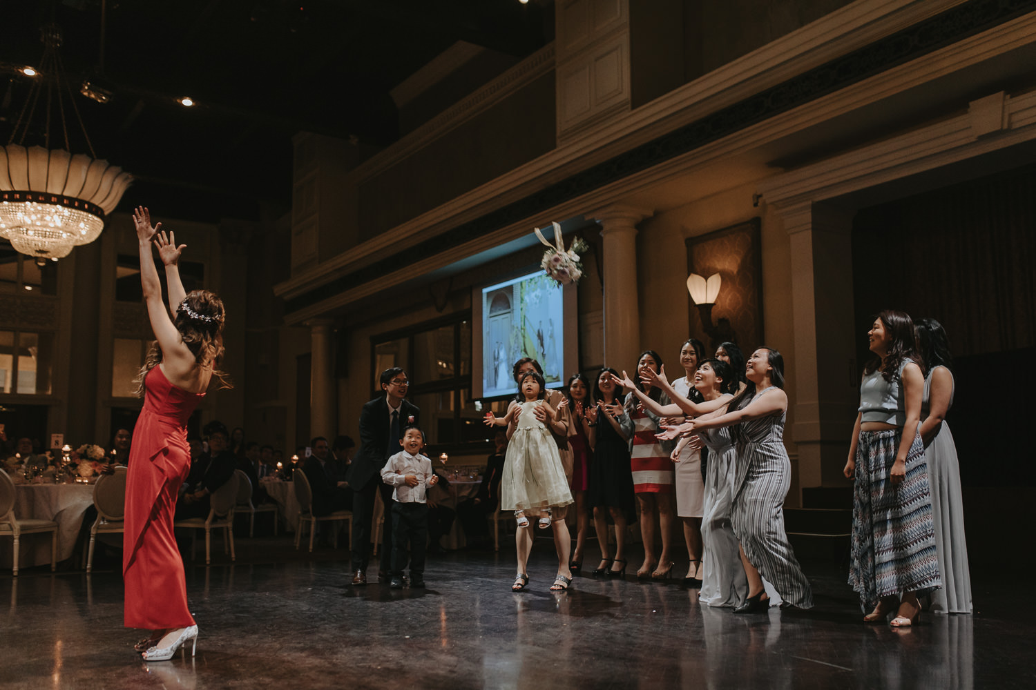 bouquet toss at Liberty Grand Wedding renaissance room