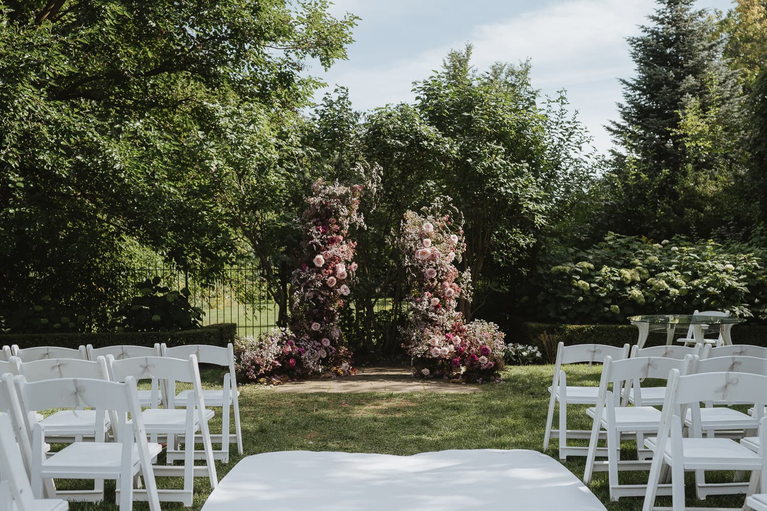 Graydon Hall Garden wedding ceremony decor with flower arch