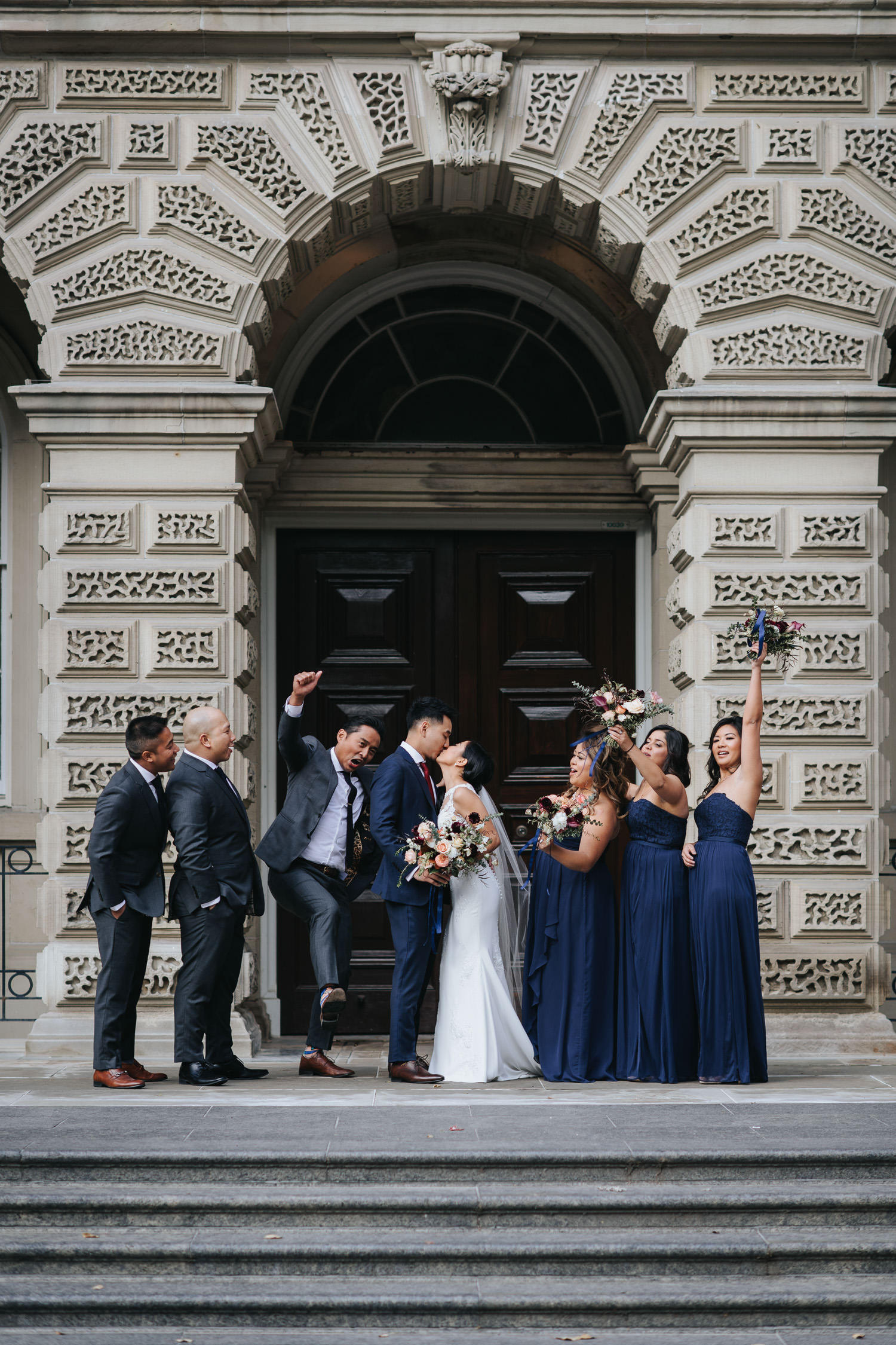 Osgoode Hall Wedding Party Cheering for the bride and groom