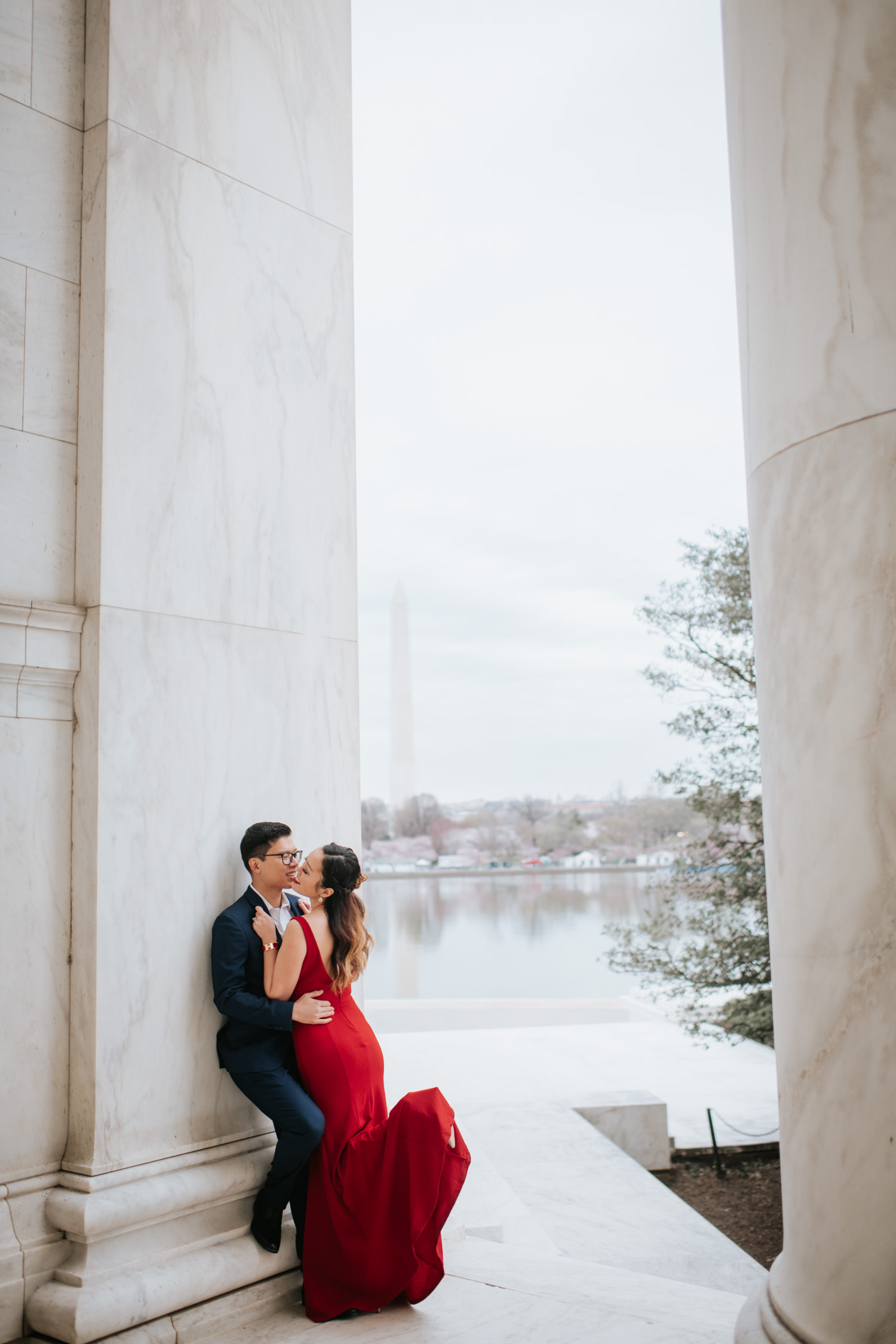 An engagement session in Jefferson Memorial overlooking Tidal Basin