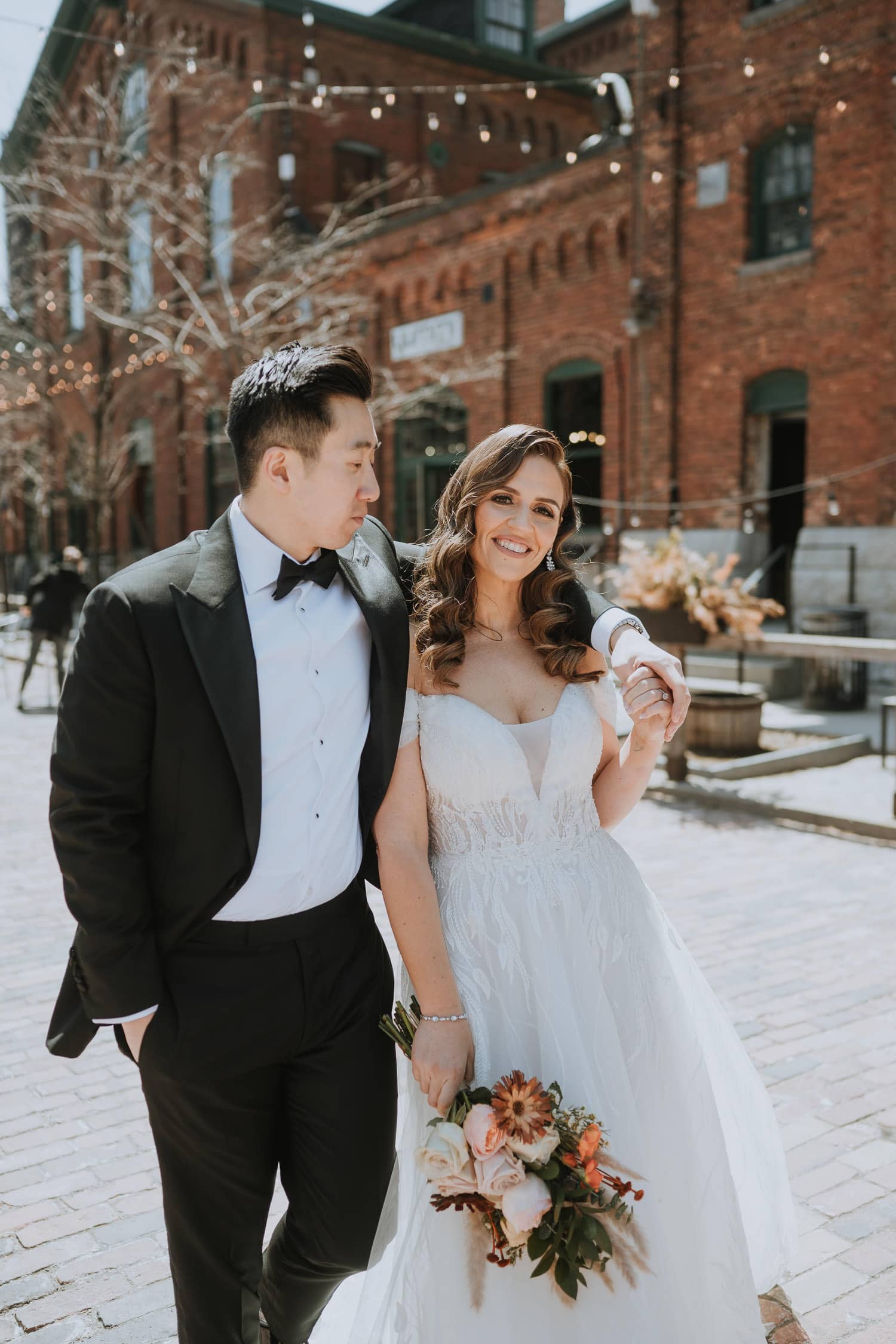 A couple's wedding portrait at the Toronto Distillery