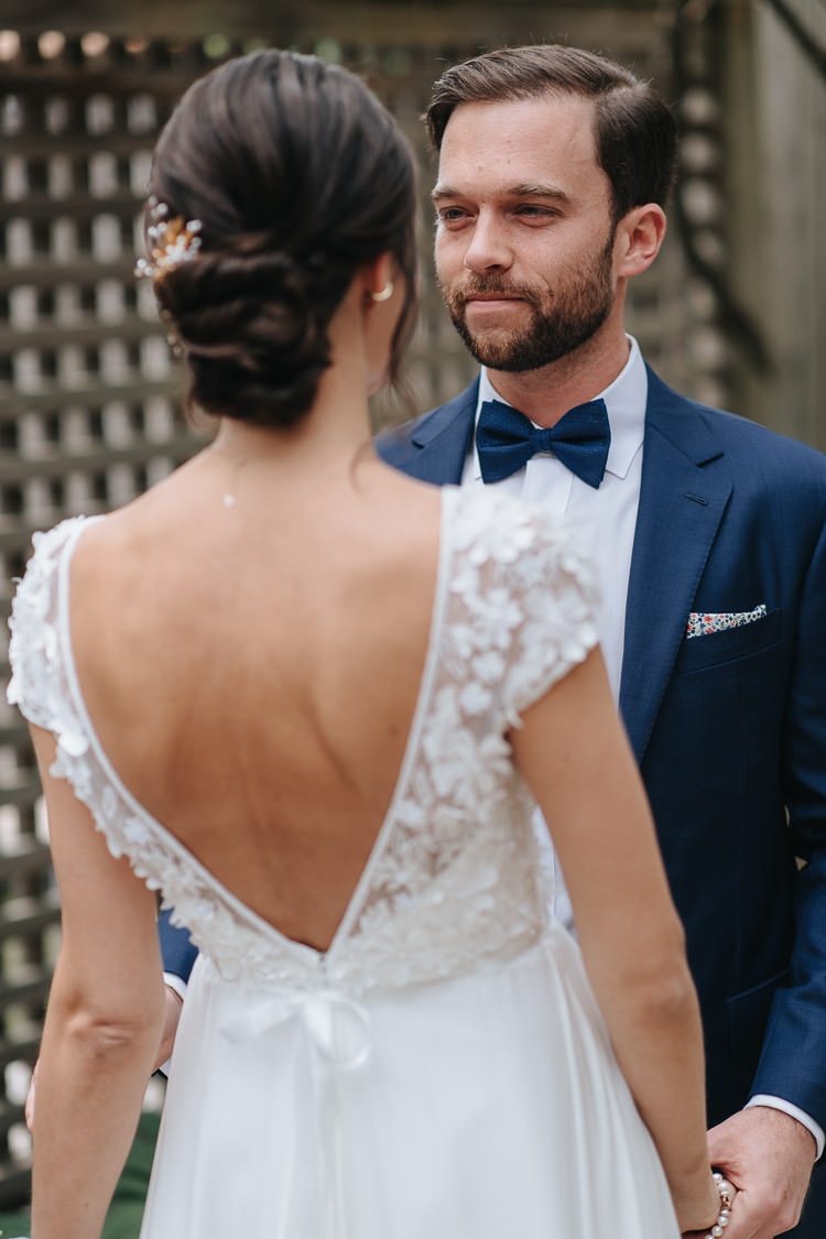 First look photo of bride and groom at Inn on the Twenty