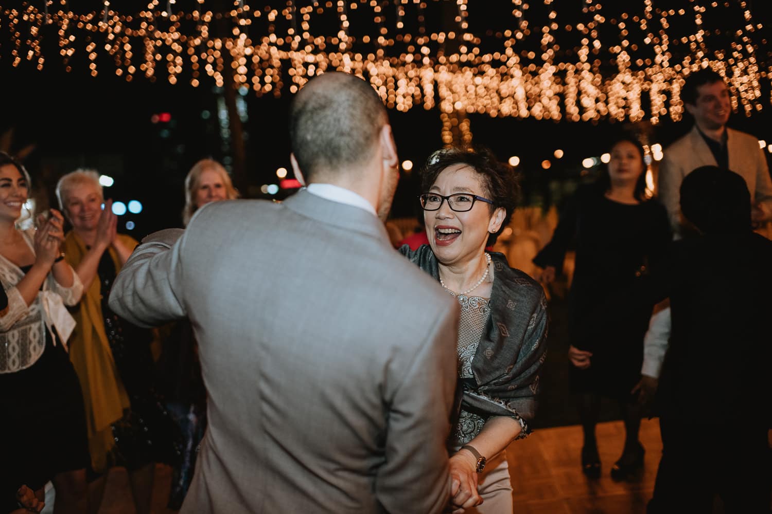 Evening String light Wedding Reception Mother and Groom Dance