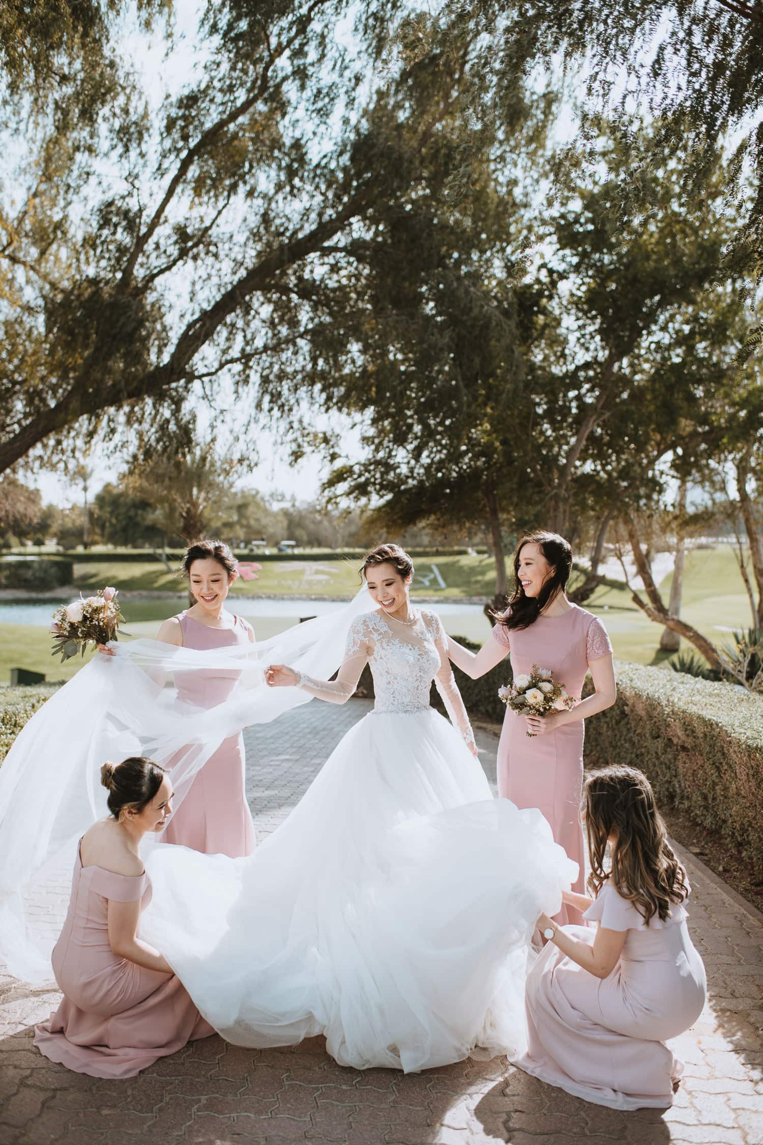 Whimsical Golf Club Wedding Bridesmaids Photo