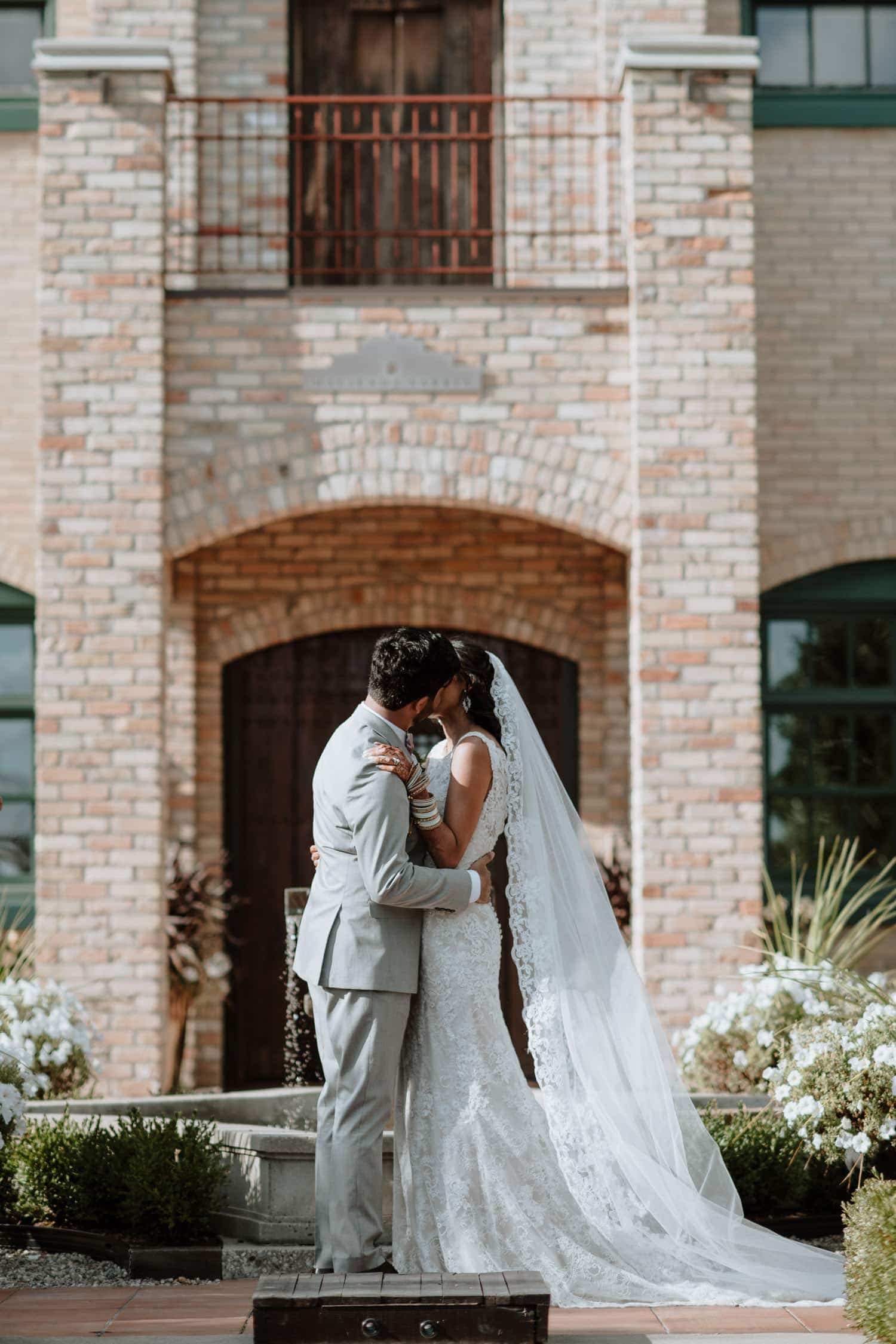 First Kiss at the outdoor Hacienda Sarria wedding ceremony