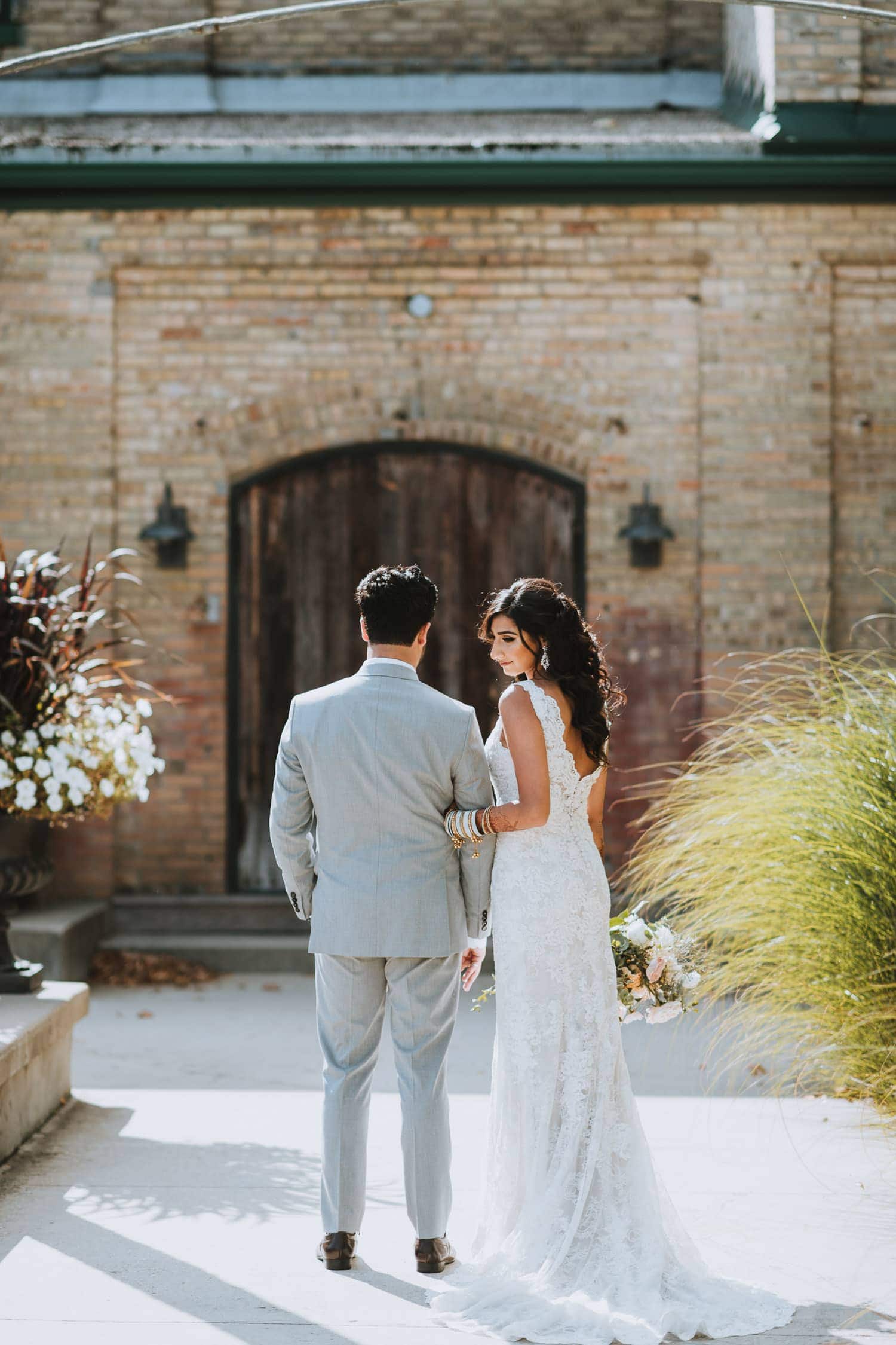 Bride and groom formal at the Hacienda Sarria patio in Kitchener, Ontario