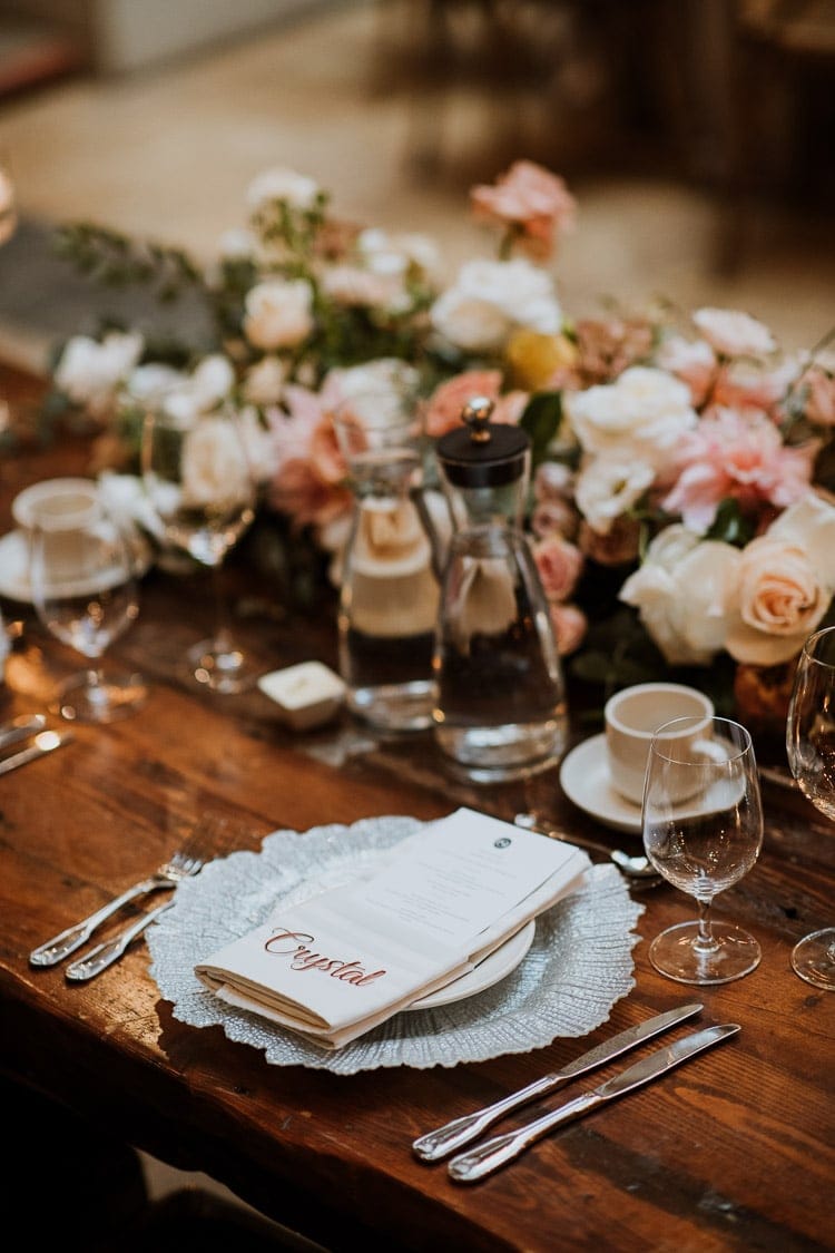Rustic head table decor setup at Hacienda Sarria wedding