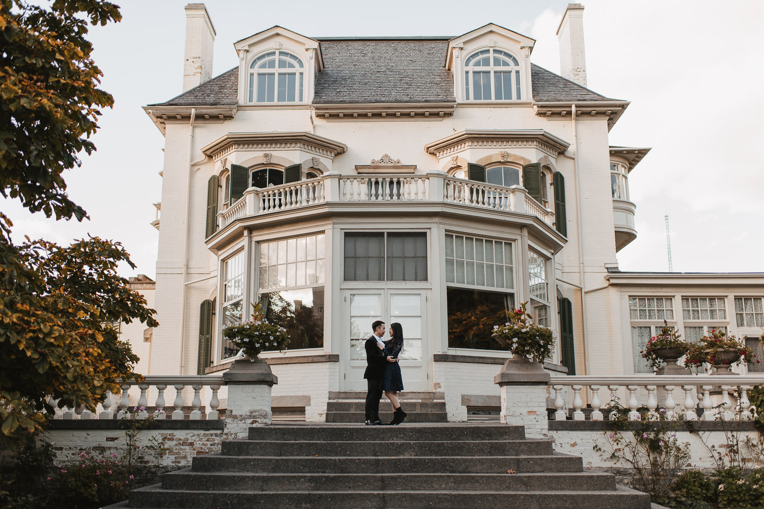 Mansion backdrop for an engagement photo session in Spadina Museum