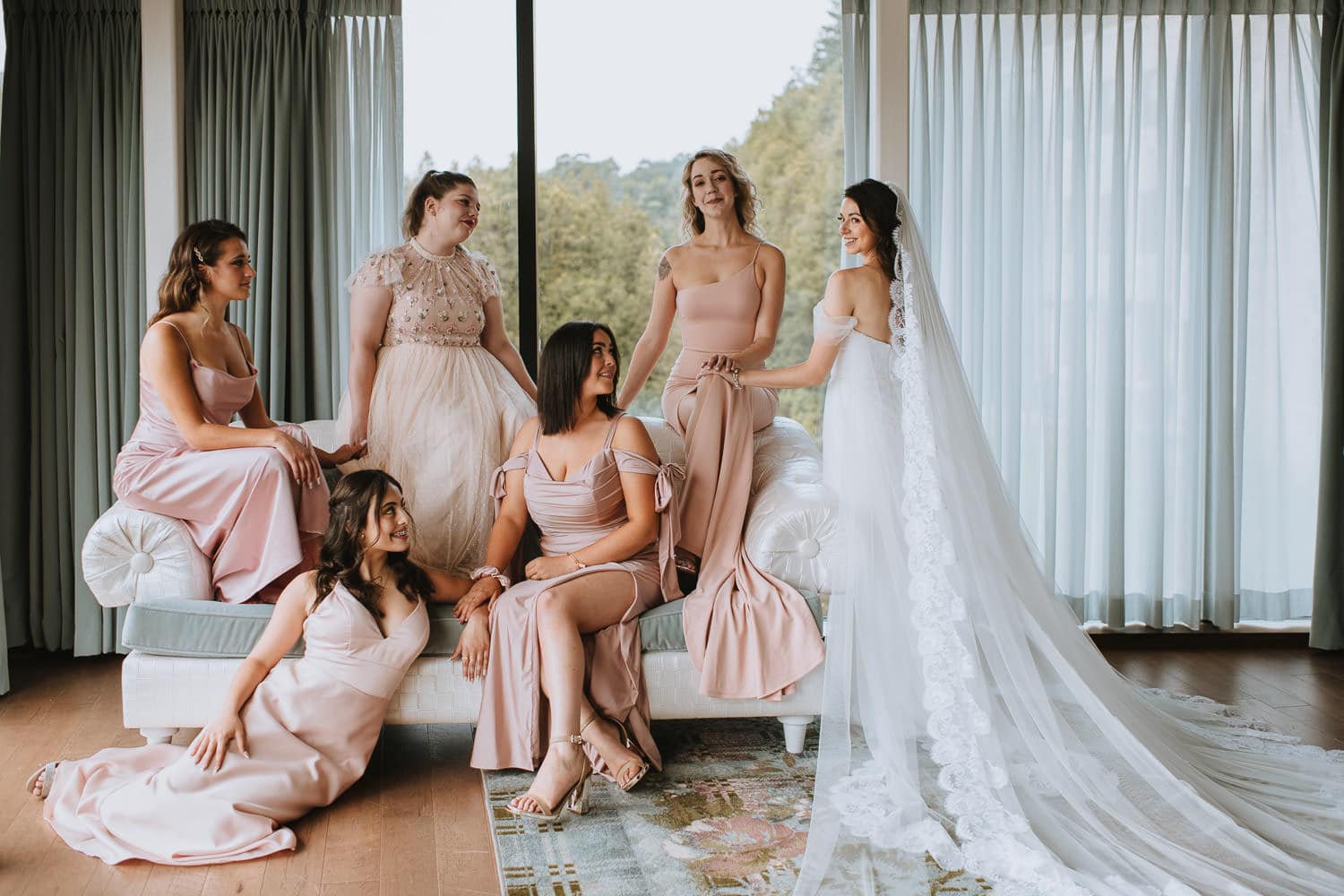 bride bridesmaids group photo at the Elora mill hotel