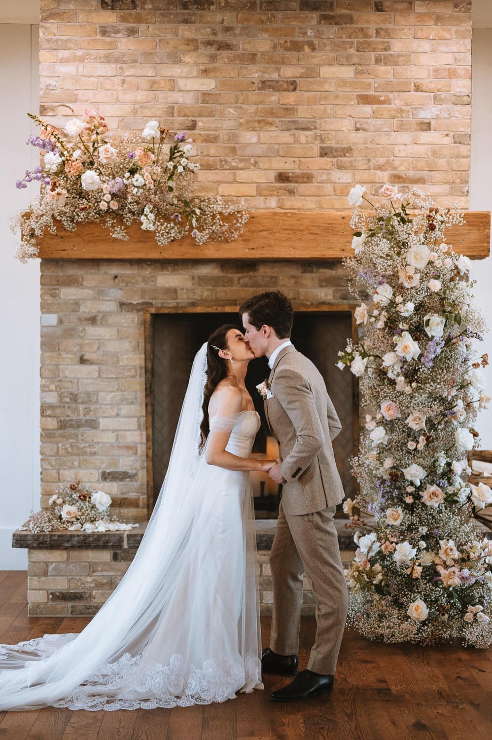 elora mill foundry chapel wedding ceremony first kiss