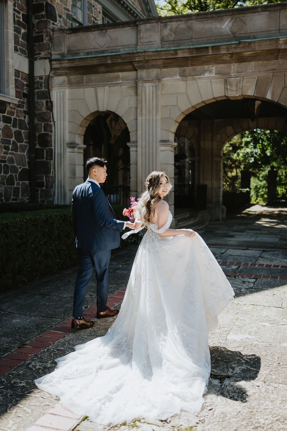 Graydon Hall bride and groom portrait at the coach gateway