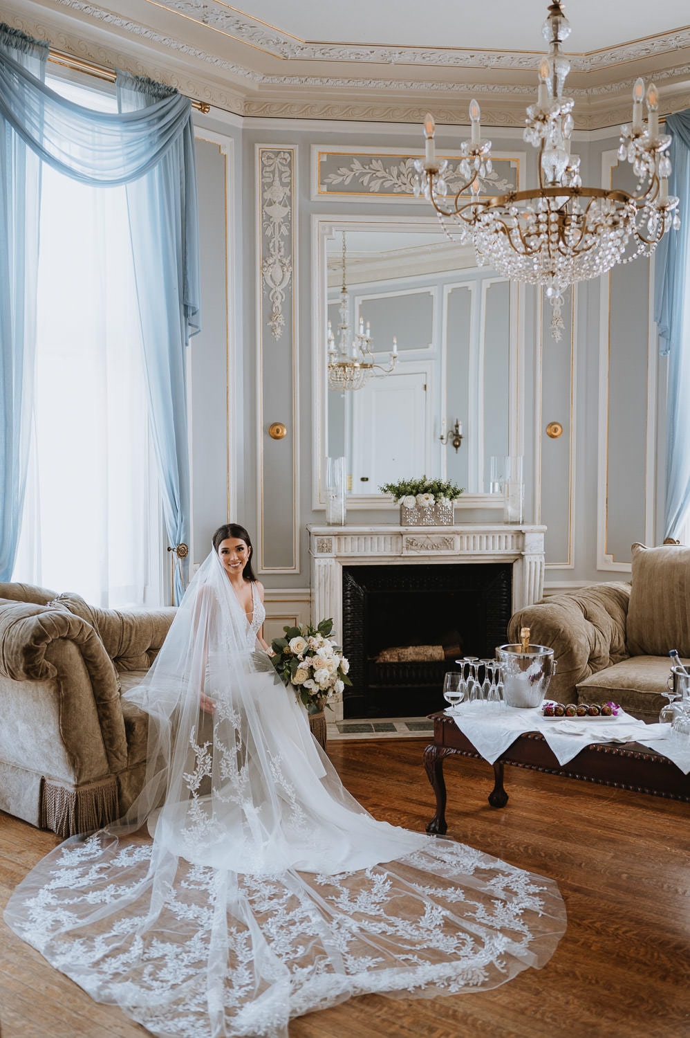 Bride sitting portrait at the Casa Loma Bridal Suite