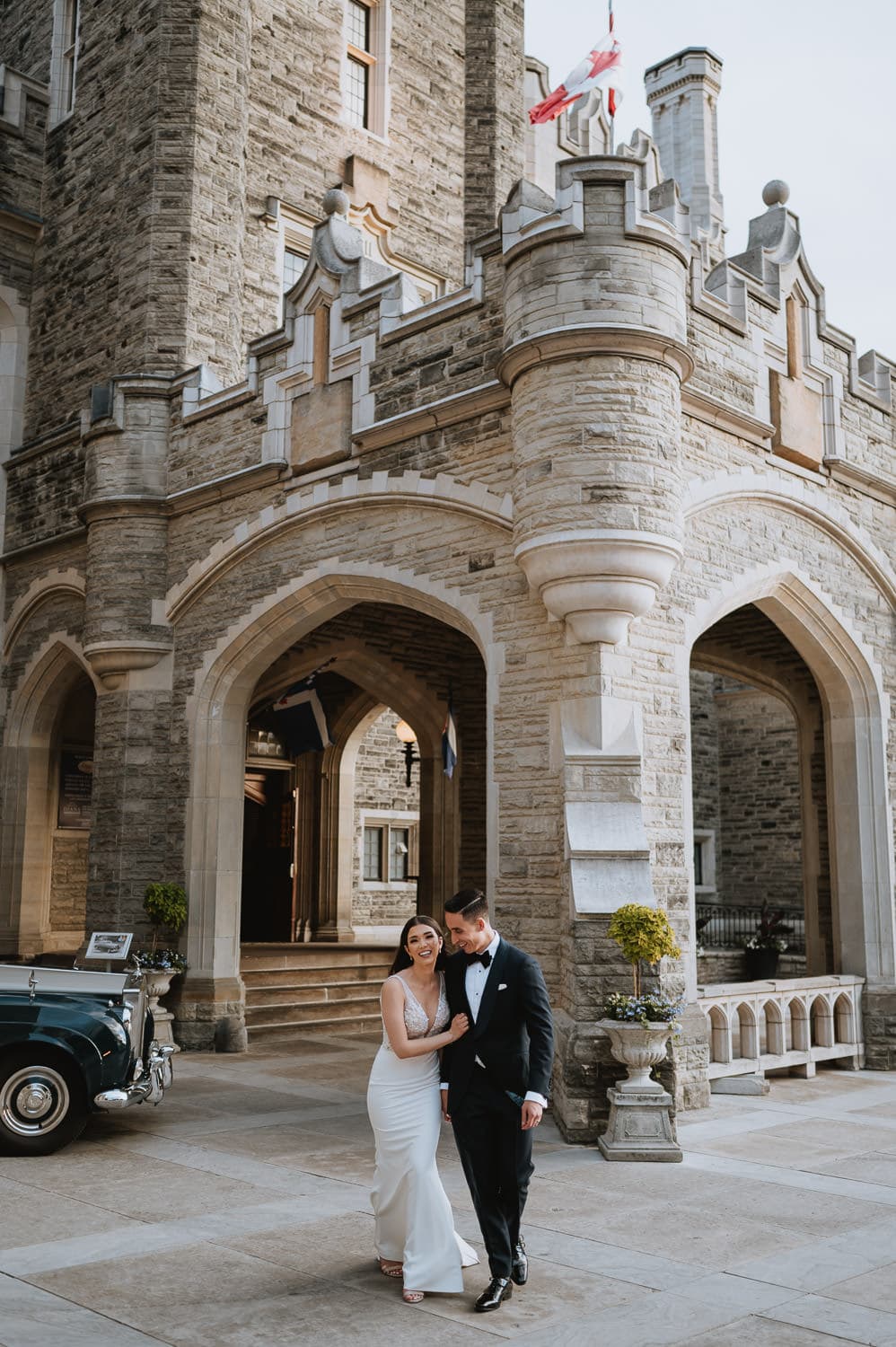 Casa Loma bride and groom portrait at the front of the castle